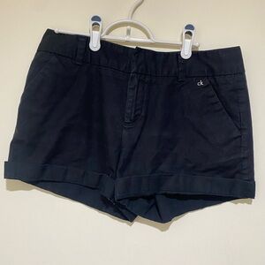 Women’s Black Calvin Klein brand Y2K hot causal shorts with slot  buttons size 8